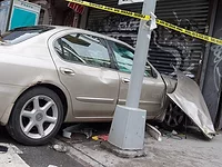 car crashed into a building car crashed into a building