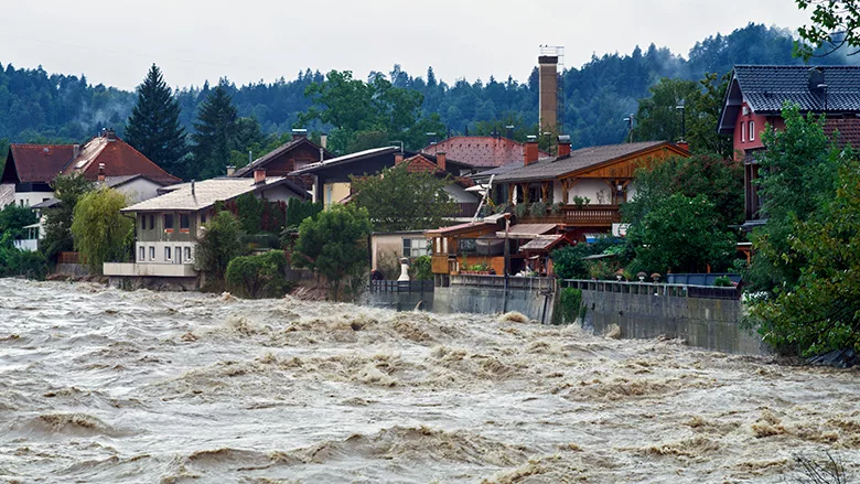 Town being flooded by river overflowing