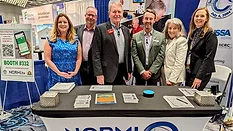 ISSA CleanFax Team with NORMI at Trade Show