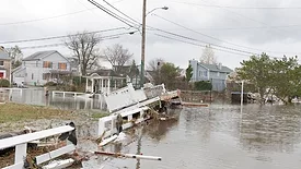 Flooded streets and debris caused by hurricane Sandy