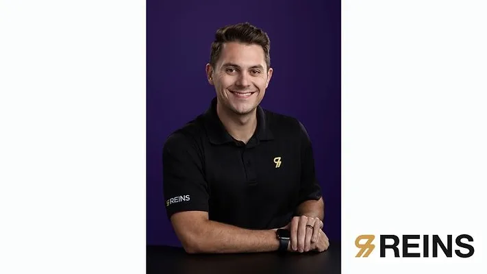 Chris Buttenham of Reins Headshot with Logo