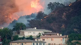 Large fire overtaking California homes 