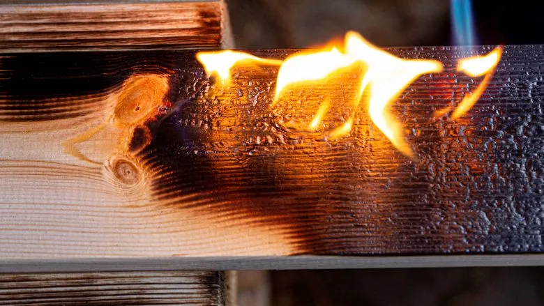 Concept of artificial aging of wooden products Wood processing by burning with gas burner, open fire, brushing