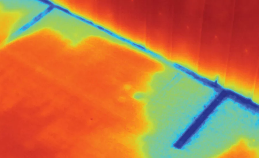 Thermal imaging moisture along floor board and under carpet
