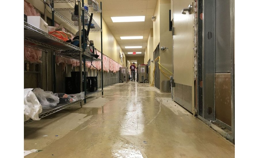 ...and then workers hit a water main next door and flooded it again