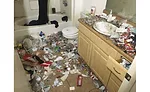 This apartment had more than 1,000 syringes in this apartment that had to be carefully removed before restoration work could start.