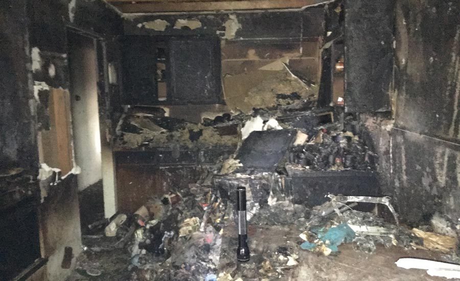 Hoarding kitchen after fire