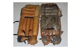 25 year-old goalie pads, before and after cleaning.