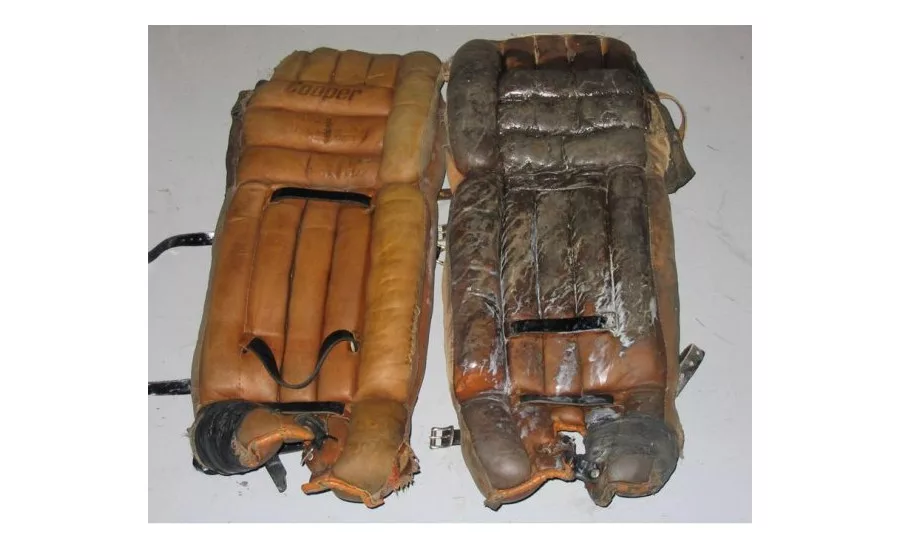 25 year-old goalie pads, before and after cleaning.