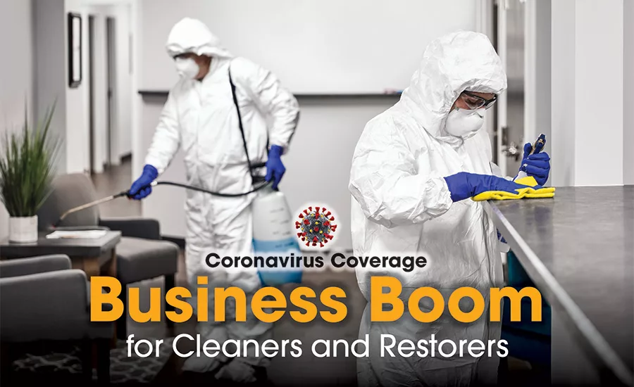 workers disinfecting a room