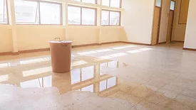 flood-damaged tile and stone