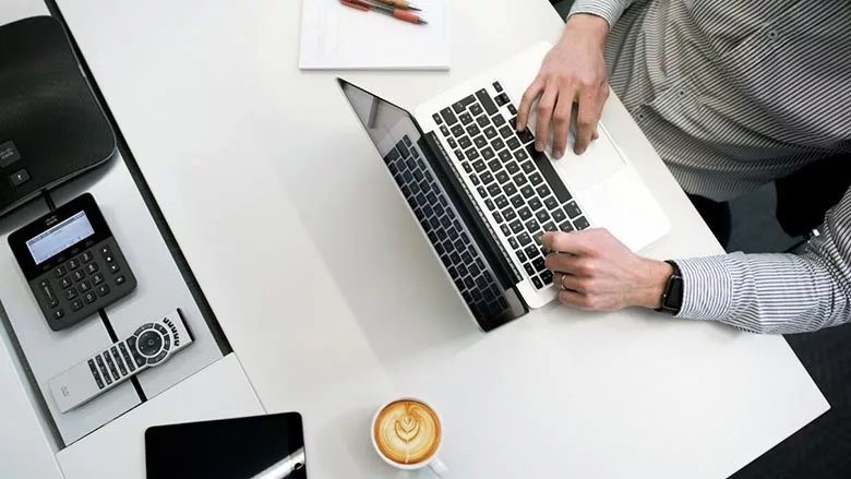 business owner calculating costs