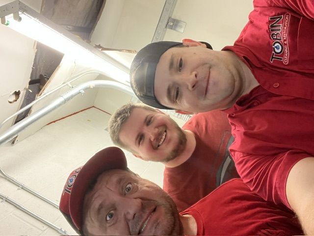 Nate Judy on a commercial restoration job