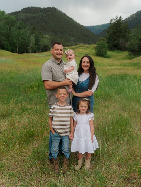 Nate Judy with his wife and kids