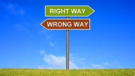 Signpost showing Right or Wrong Way