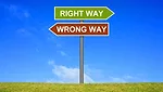 Signpost showing Right or Wrong Way