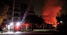 Firefighters battled the nighttime blaze