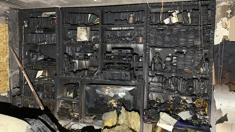 smoke-damaged media shelf