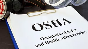 Pile of Documents with Occupational Safety and Health Administration OSHA