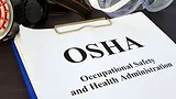 Pile of Documents with Occupational Safety and Health Administration OSHA
