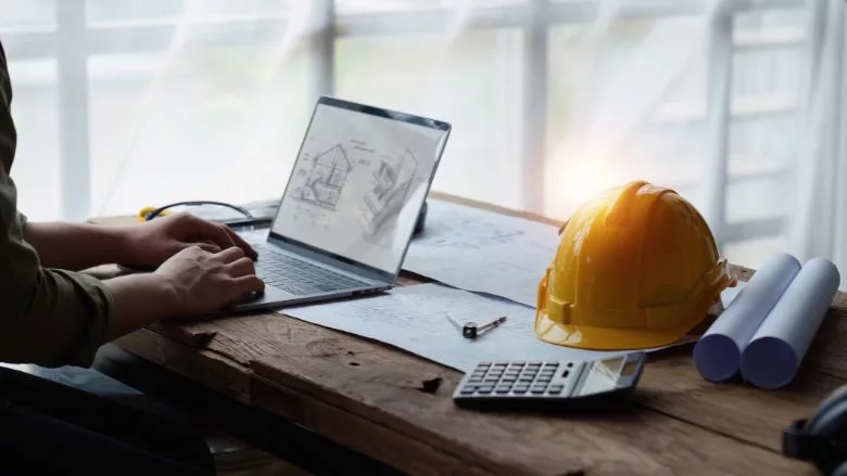 engineer sketching a construction project