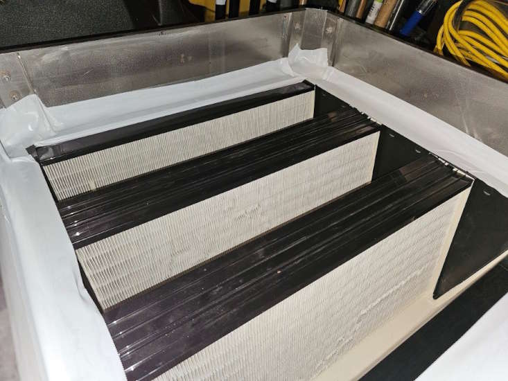 tape reinforcing gasket seal on HEPA filter