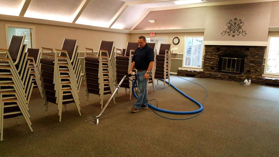 Darren cleaning carpet