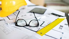 Closeup of working tools on table at construction site