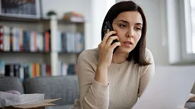 Frustrated woman contacting customer service about a delivery problem 