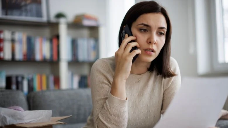 Frustrated woman contacting customer service about a delivery problem