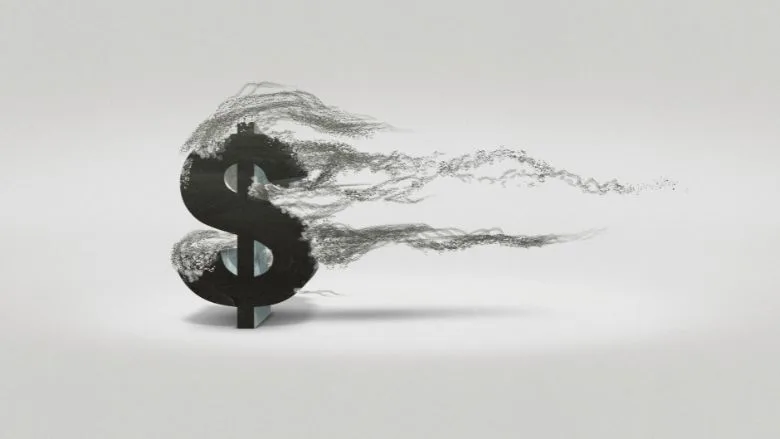 Dollar sign blowing away