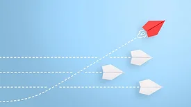 red paper airplane on a growth trajectory