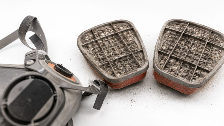 A pair of filters for a respirator and replaceable cartridges