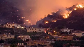 Fire approaching homes in California
