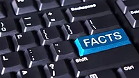 Computer keyboard with "fact" word